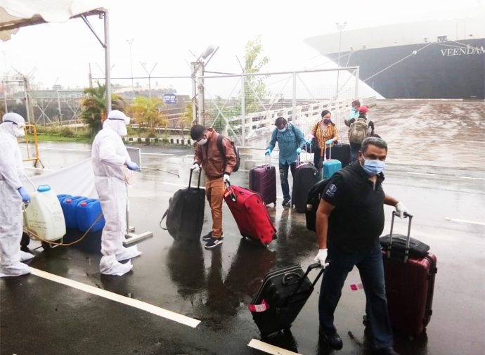 Gac brings 3000 indian seafarers home photo 1 crew members disembarking from a cruise ship in cochin